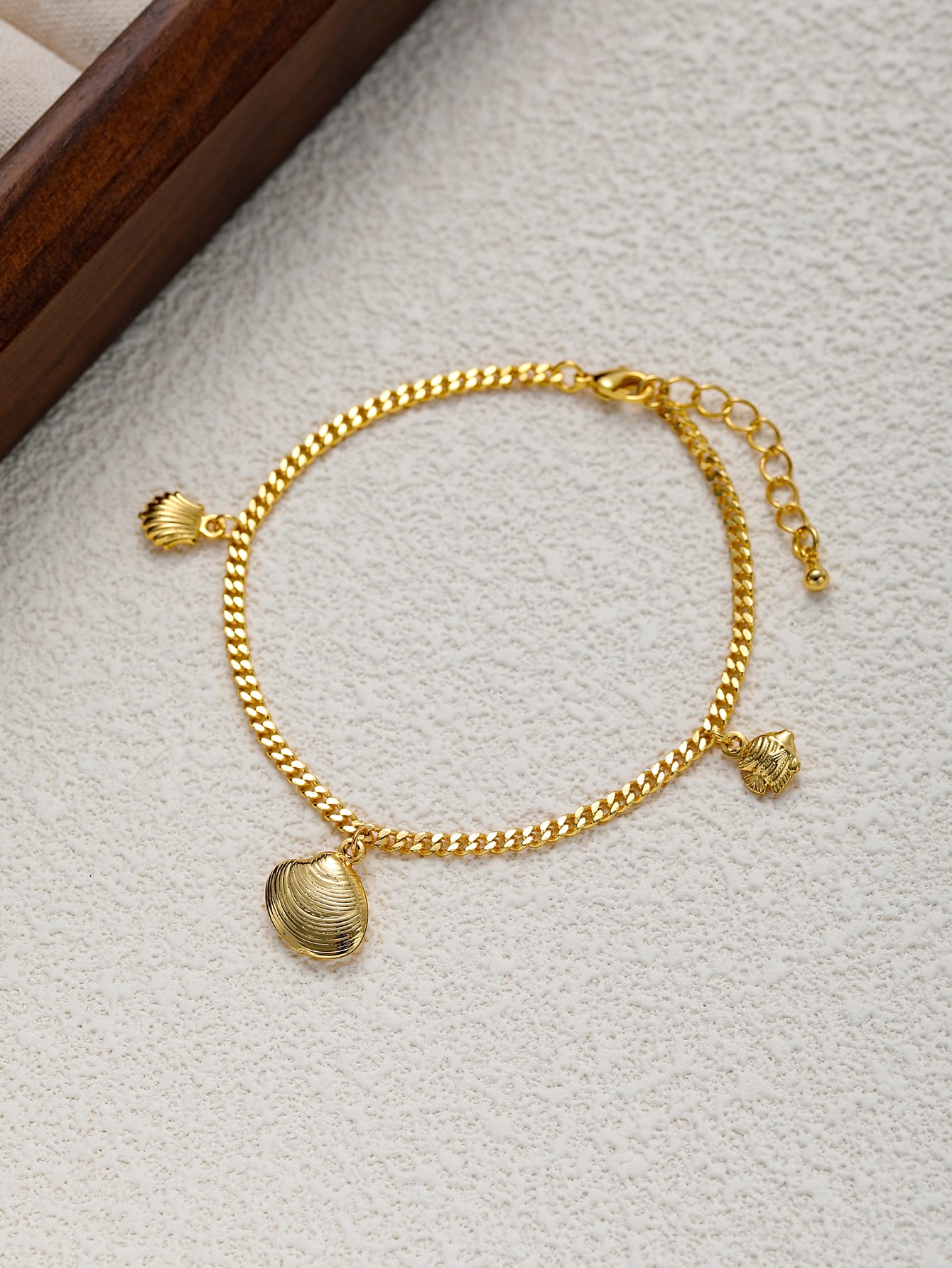 Gold Shell Charm Bracelet with Curb Chain